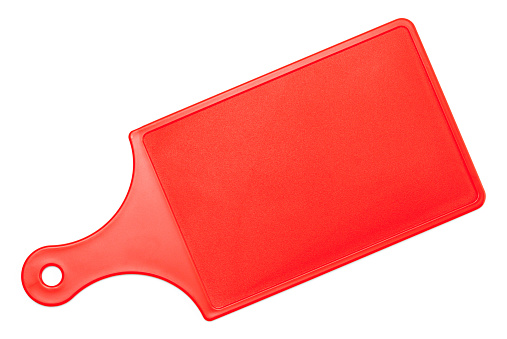 Small Red Plastic Cutting Board Top View Cut Out on White.