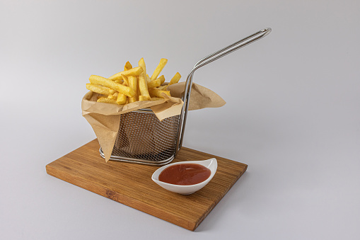 Basket of French fries in local beer pub