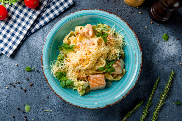 istock fettuccine with salmon and parmesan top view 1461209521