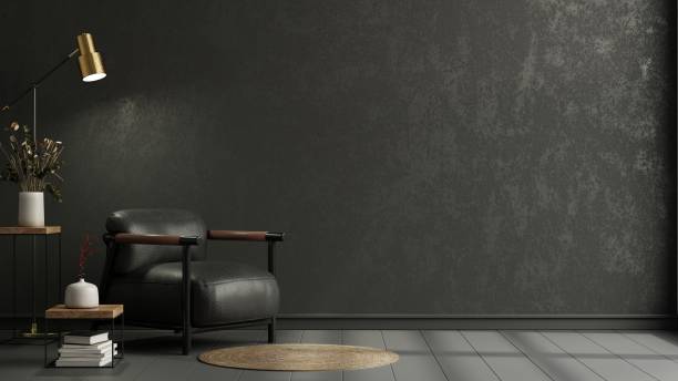 istock Wall mockup in black tones with leather armchair on dark wall. 1461218095