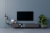 LED TV on the dark blue wall in living room,minimal design.