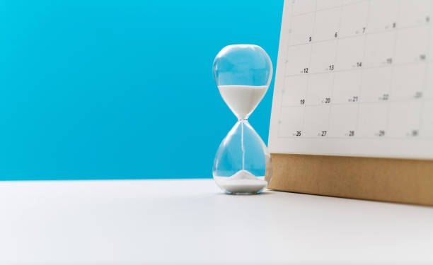 istock Calendar and hourglass on the table 1461221042
