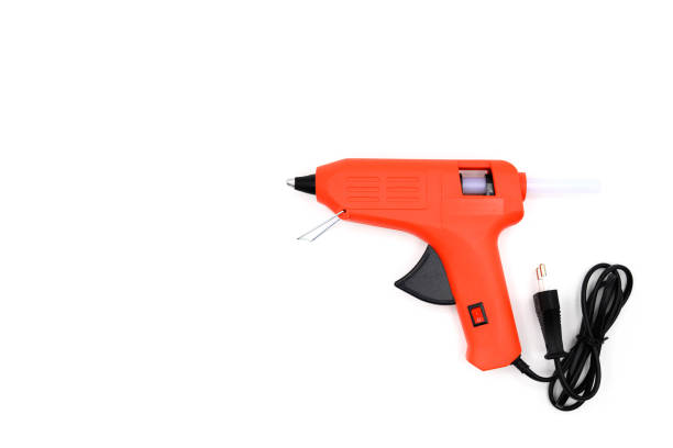 istock red glue gun close-up on a white background 1461224436