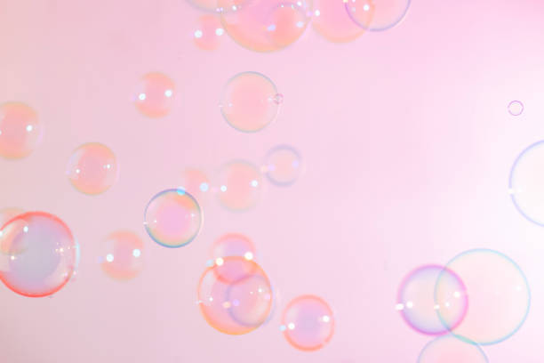 istock Beautiful Pink Soap Bubbles Abstract Background. Defocus, Blurred Celebration, Romantic Love ValentinesTheme. Circles Bubbles. Freshness Soap Sud Bubbles Water 1461226737