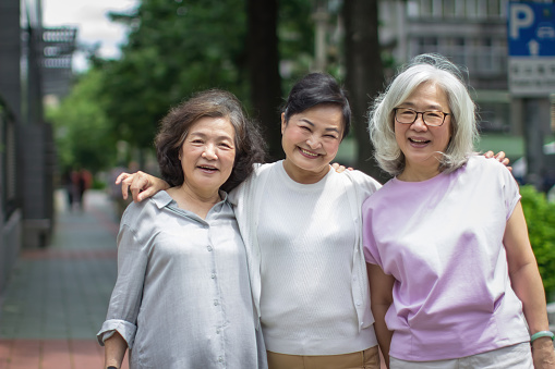 Group of  beautiful elderly women having fun in the city