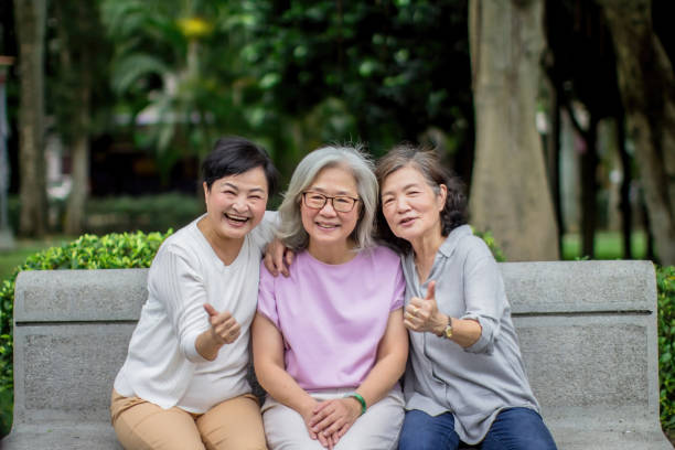 istock Three old ladies with thumbs up 1461230178