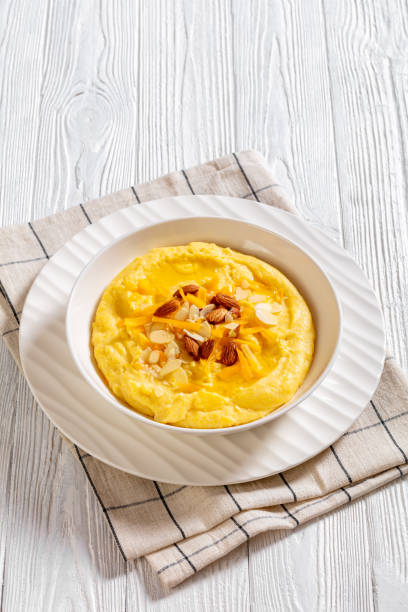 istock corn grits with butter, vegan cheese, and almonds 1461239488