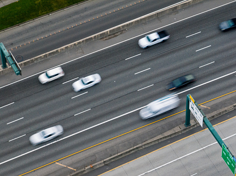 Traffic traveling on the freeway.  Aerial view of cars moving through Downtown Bellevue Washington.