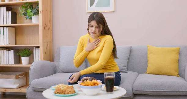 istock Asian woman want vomit 1461243237