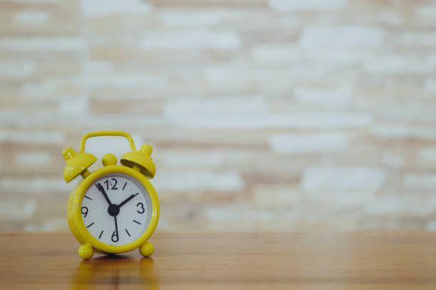 istock Red alarm clock isolated on a white background. Time is precious. Time concept. 1461258194