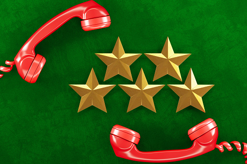5 Star Review Concept with Retro Red Phones. 3D Render