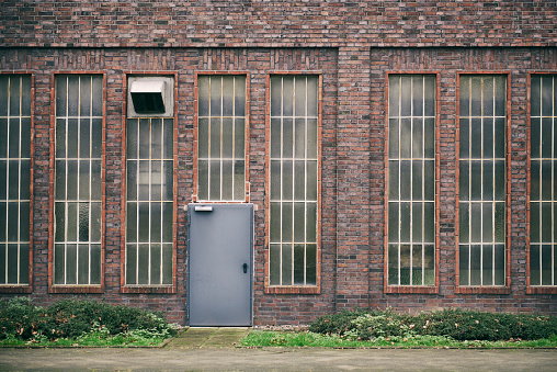 Steel door of an old industrial building.