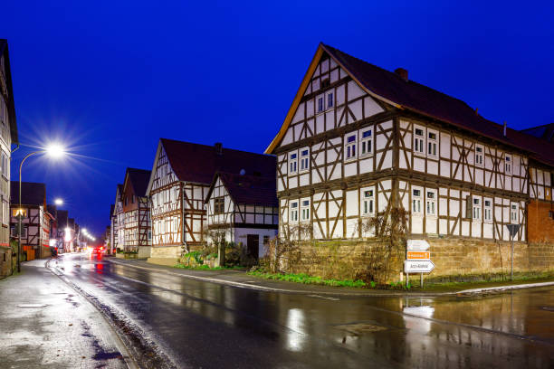 the historic village of herleshausen at night - mansion tudor style non urban scene residential structure imagens e fotografias de stock