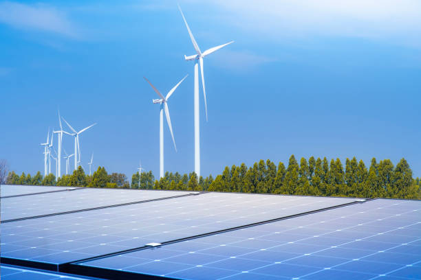 istock wind turbine and a solar panel are renewable energy.  Both technologies are used to provide renewable energy to businesses, homes, and public buildings.for smart city and new generation of power. 1461267790