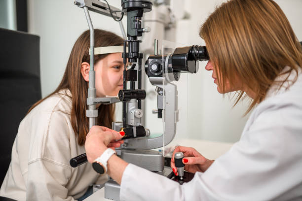 istock Young Patient Showing Tranquility while Being Assessed by Eye Test Equipment 1461268365