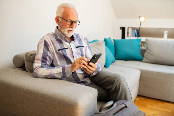 istock Pensioner is preparing for a trip 1461269471