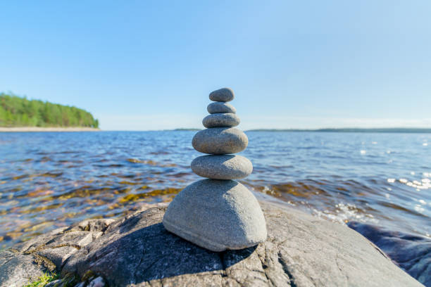 istock Pyramid of stones. Unstable balance of stone objects. 1461270099