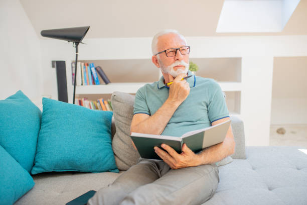 istock Senior man working at home 1461270223