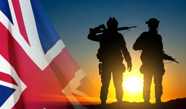 Vector illustration of Silhouettes of a soldiers with United Kingdom flag