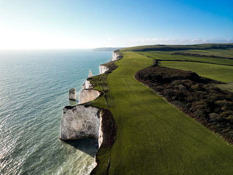 This is a drone shot in great Britain of big cliff