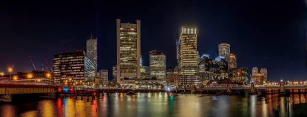 istock Panoramic shot of illuminated buildings reflecting in the water 1461276941