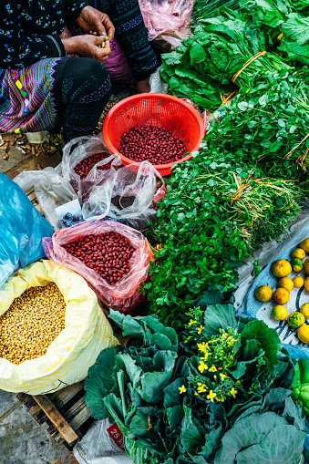 A colorful array of vegetable displayed for sale at the local market in Bac Ha, Vietnam. 
the market, held every Sunday, is a very colorful market where hilltribe people come to trade for goods