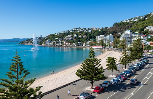 Wellington, New Zealand – April 26, 2016: A scenic view of Oriental Bay in Wellington with the Carter fountain In the ocean