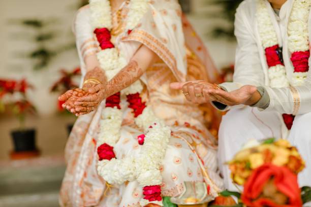 istock Bride and Groom at the Indian Wedding with Garlands 1461282780