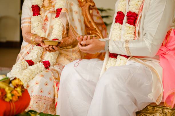 istock Bride and Groom at the Indian Wedding with Garlands 1461282819