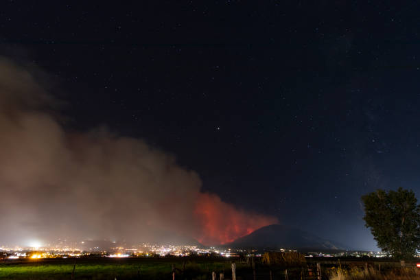 A cloud of smoke because of the fire at night