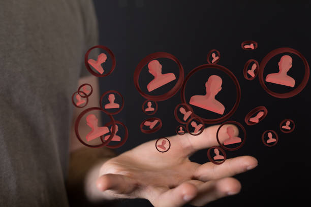 istock And communications thematic background with floating digital icons in front of hands 1461289270