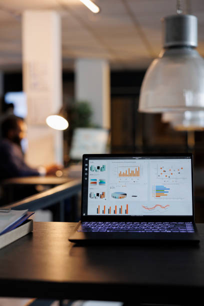 istock Laptop computer with company investment profit progress 1461289575