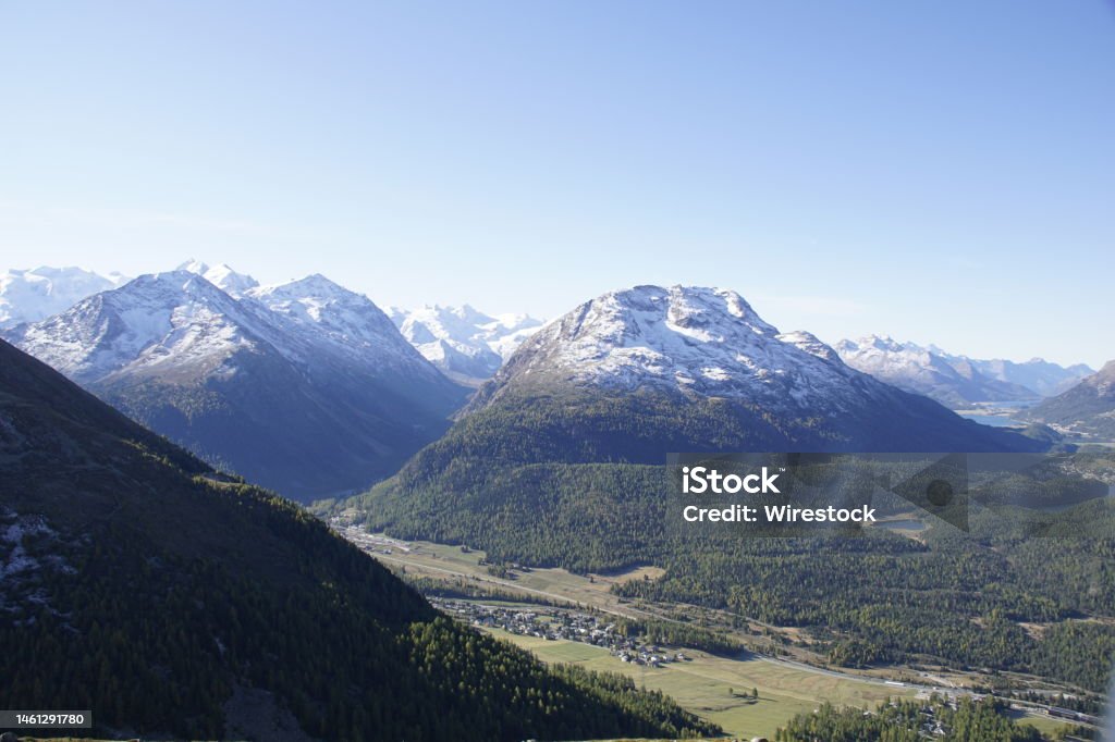 Scenic view of the mountains and the valley in Muottas Muragl, Samedan, Switzerland A scenic view of the mountains and the valley in Muottas Muragl, Samedan, Switzerland Beauty Stock Photo