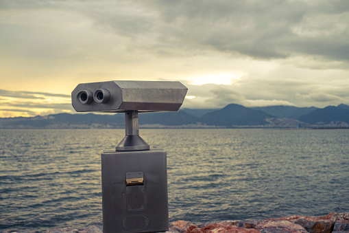 View of a public binocular in seaside.