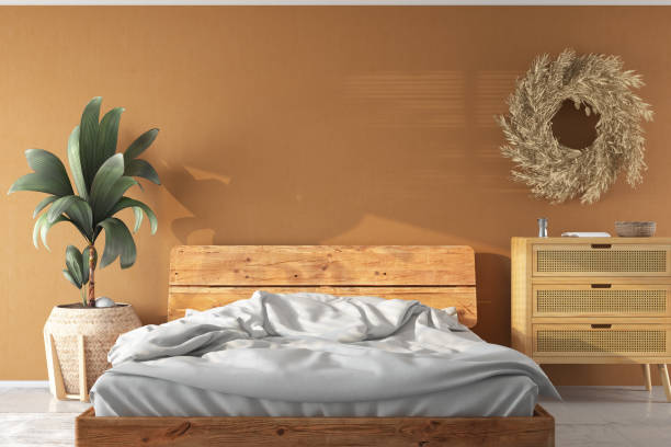 Cozy Bedroom with a Wooden Floor Bed and Empty Beige Wall