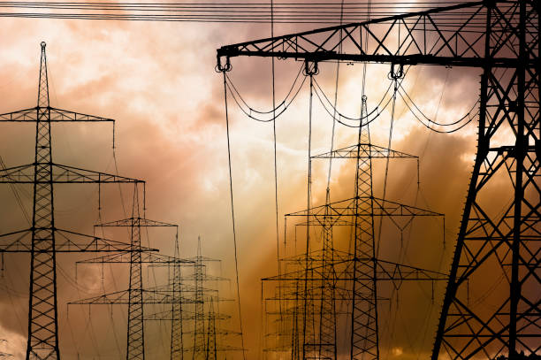 istock high voltage pylons for electricity and power against sky with dramatic clouds 1461297077