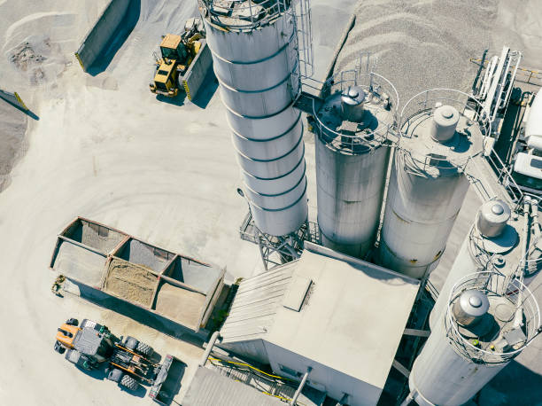 Cement Factory. Industrial Background. Aerial View. Cement Factory. Industrial Background. Aerial View of Cement Production Process. Sand Mixing Plant with Heavy Equipment. cement work stock pictures, royalty-free photos & images