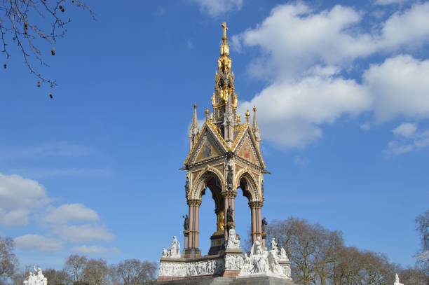 istock Albert Memorial under a blue sky with clouds in London, England. 1461299660