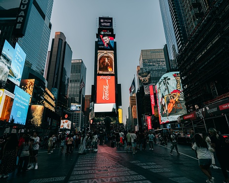 NEW YORK, United States – September 15, 2022: An overcrowded Time square in New York architecture and billboards in the evening