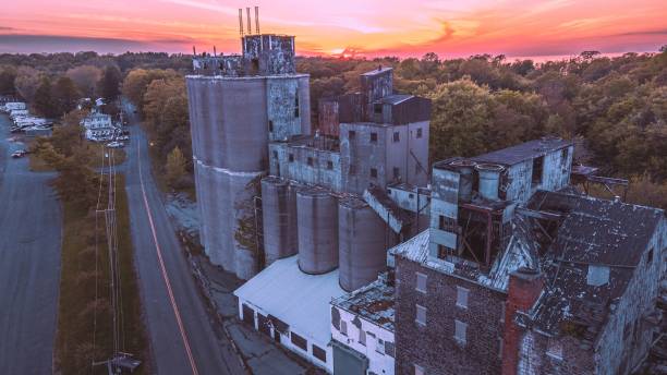 Aerial view of an old Malt House located in Sodus Point, New York seen during sunset An aerial view of an old Malt House located in Sodus Point, New York seen during sunset rochester new york state stock pictures, royalty-free photos & images