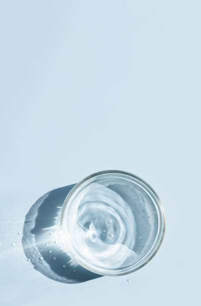 istock petri dish with liquid water on plain on a light background water ripple texture 1461302637
