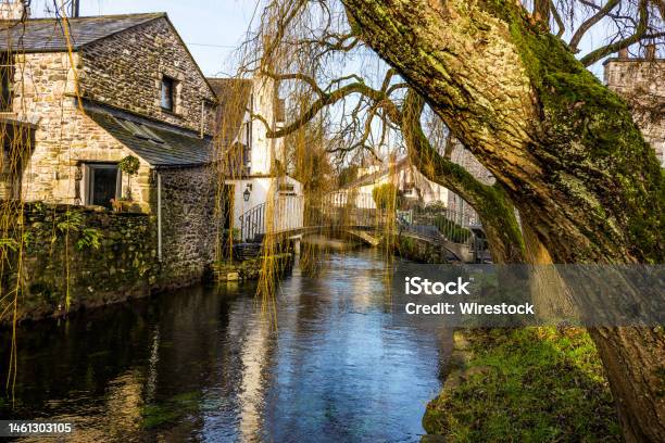 River Eea Flows Through The Picturesque Village Of Cartmel Cumbria Stock Photo - Download Image Now