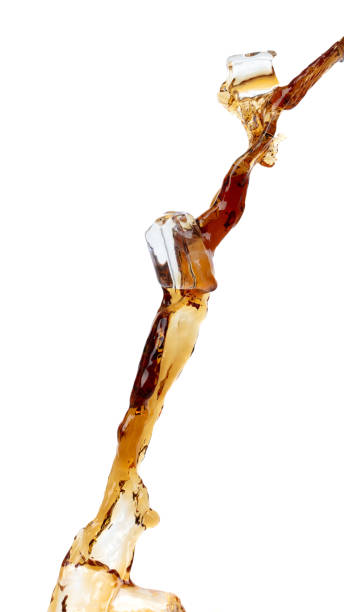 istock Coffee drink water mix ice cube fall pouring down in Shape form line of espresso black coffee splashes into drop soda cola attack fluttering in air, stop motion freeze shot. Splash coffee cola drink 1461315627