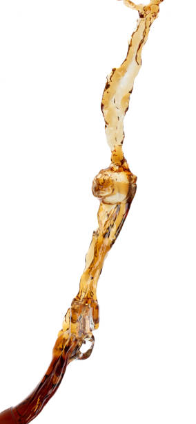 istock Coffee drink water mix ice cube fall pouring down in Shape form line of espresso black coffee splashes into drop soda cola attack fluttering in air, stop motion freeze shot. Splash coffee cola drink 1461316856