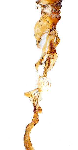 istock Coffee drink water mix ice cube fall pouring down in Shape form line of espresso black coffee splashes into drop soda cola attack fluttering in air, stop motion freeze shot. Splash coffee cola drink 1461316940