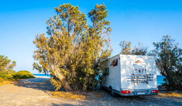 istock Motorhome parked on an amazing beach, Crete, Greece. 1461320297