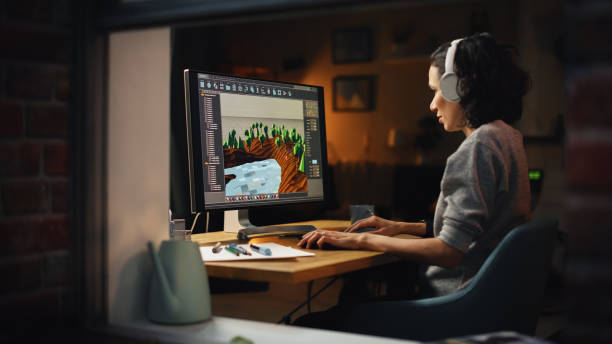 Video Game Designers At Work Female Video Game Designer Works On A New 3d Level On Personal Computer Focused Woman 