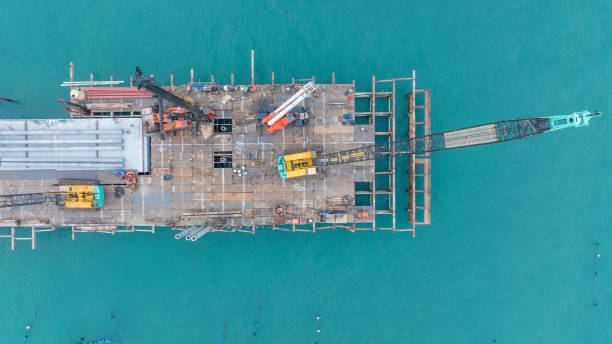 istock Building Construction Bridge, completion of the bridge for Shipping to Ship. Cable. bottom view 1461321303