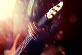 Playing electric guitar in blurred motion