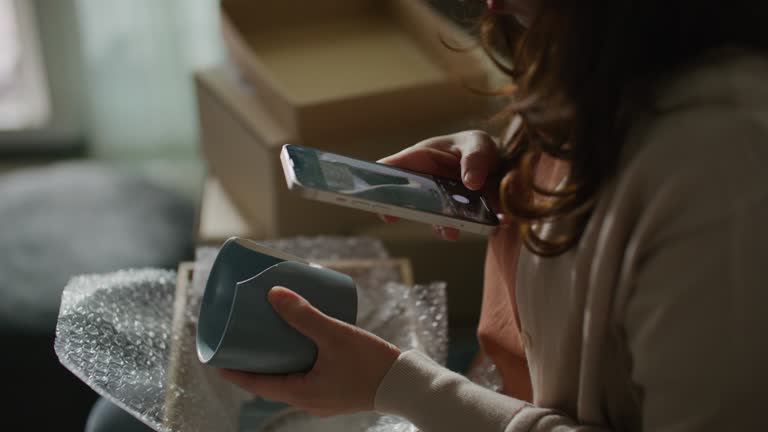 Asian Woman receiving damaged goods product